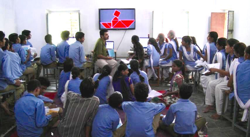 Students of a school are introduced to Tangram activity during an i2C (Invitation to CLIx) pilot in Kachroda, Rajasthan (September 2015)